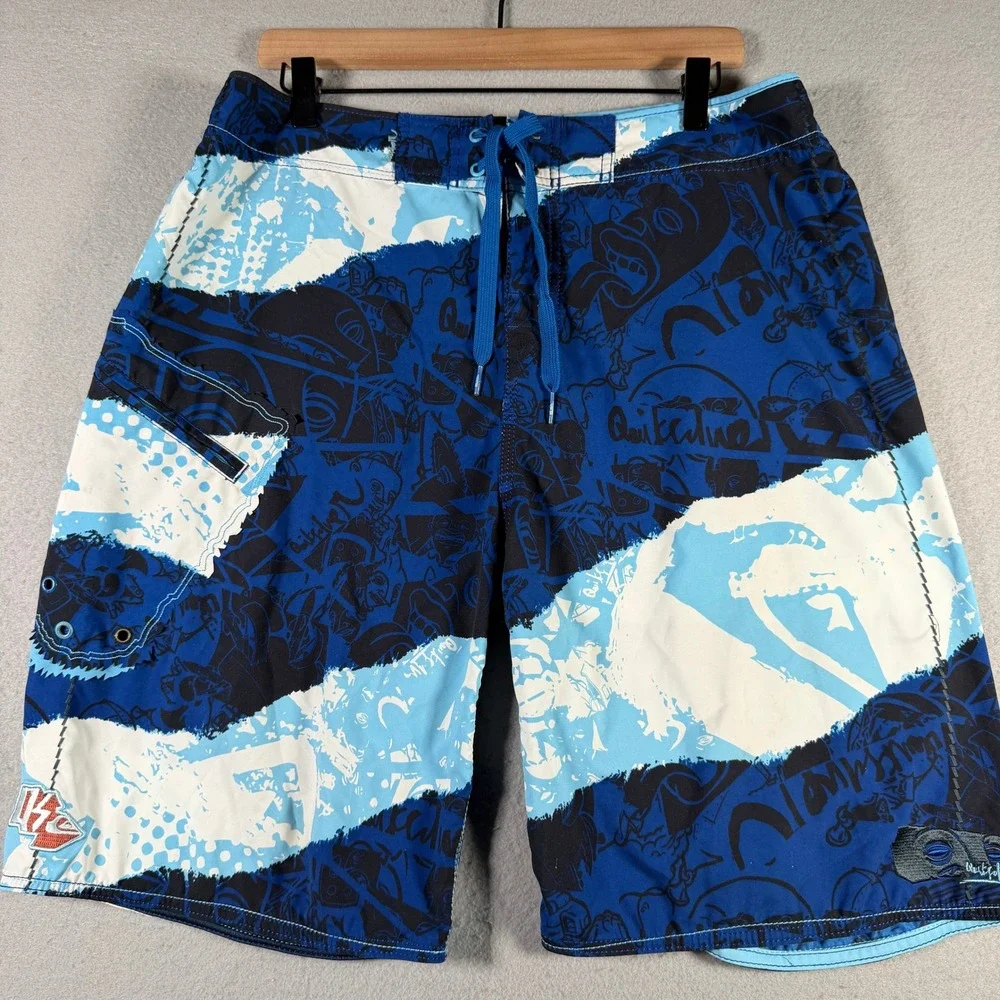 Vintage Quiksilver Mens Blue Graphic Print Board Shorts Size 34 Surf Swim Trunks